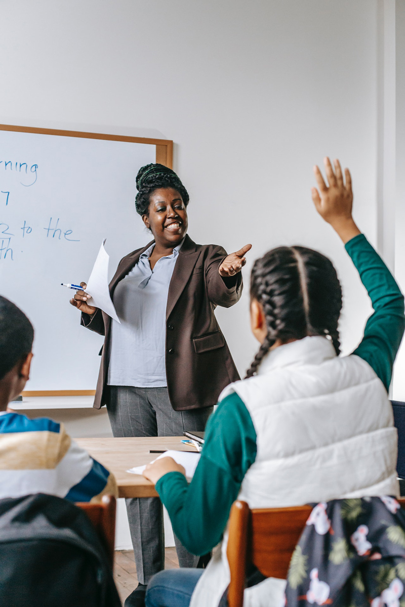 a teacher with students